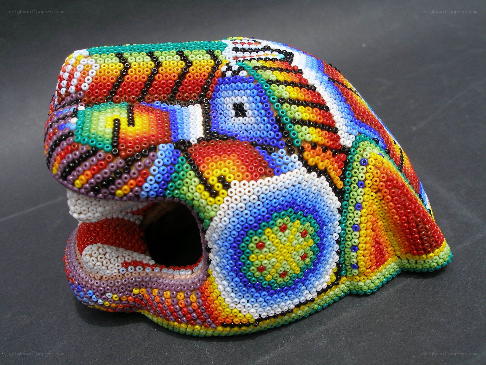 colorful beaded animal mask