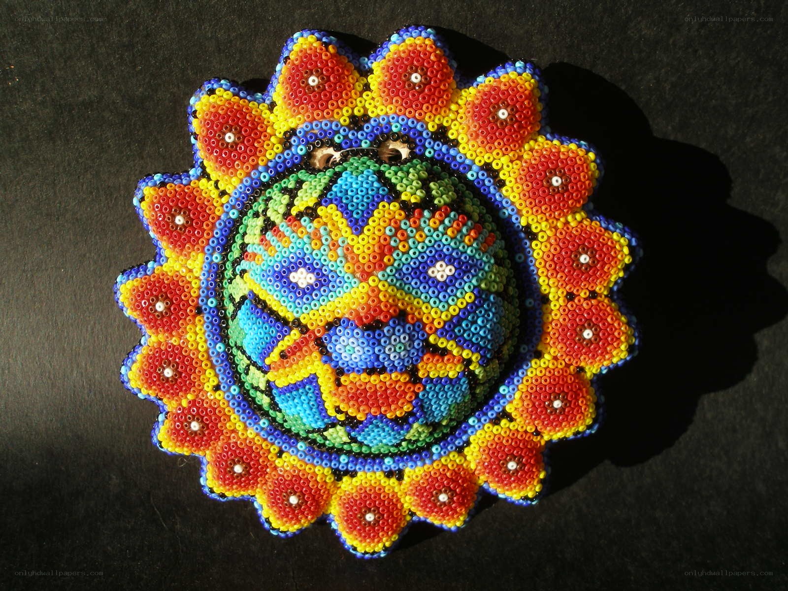 colorful beaded sun design