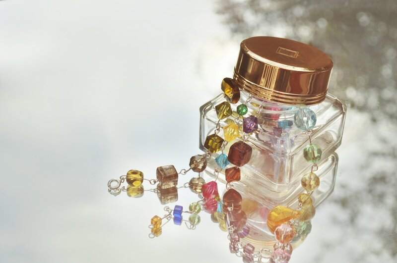 Colorful Beads on Glass Jar