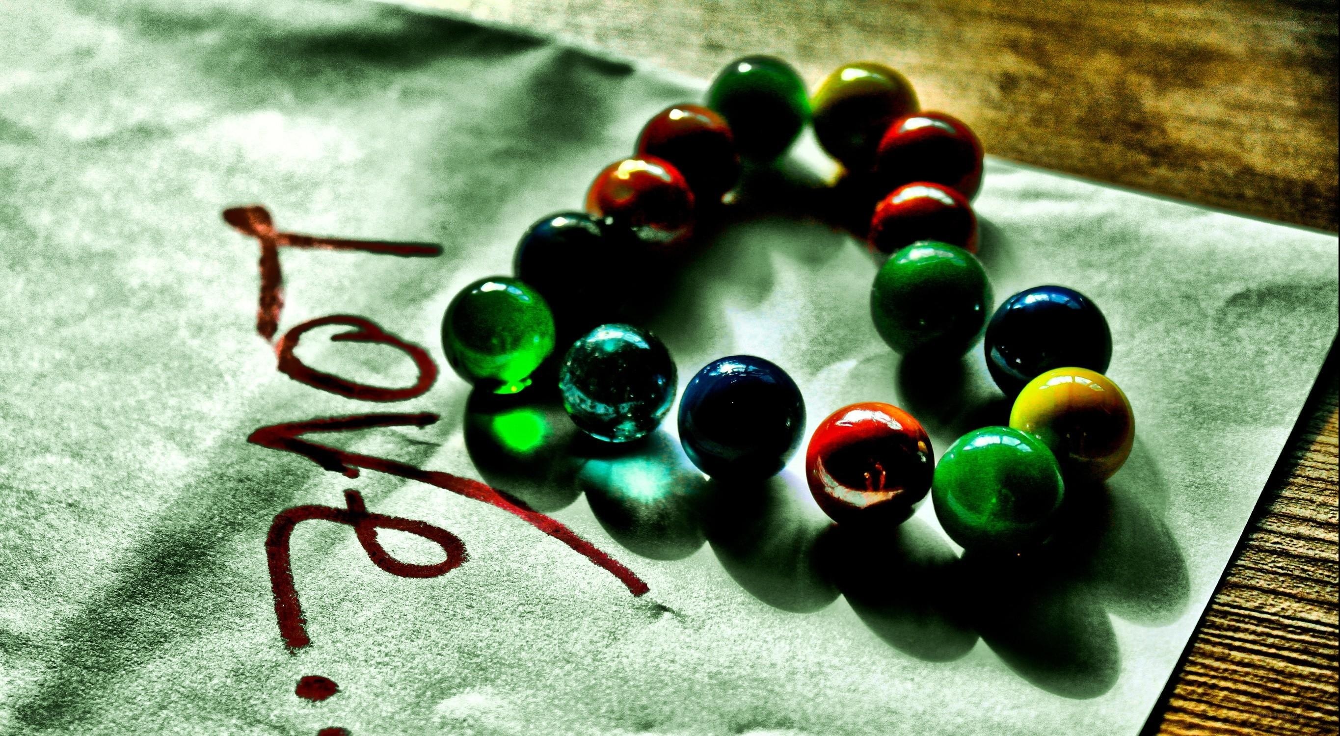 Colorful beads on paper