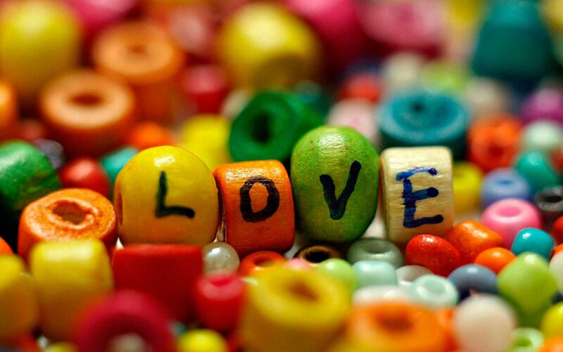Colorful Beads Spelling Love — Yellow, Playful, Photograph, Letters