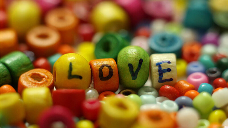 Colorful Beads Spelling Love — Yellow, Playful