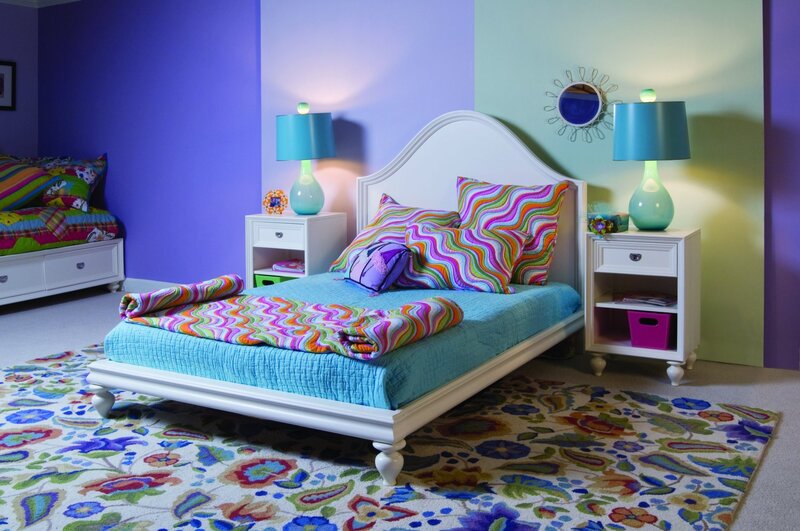 Colorful bedroom with patterned bedding