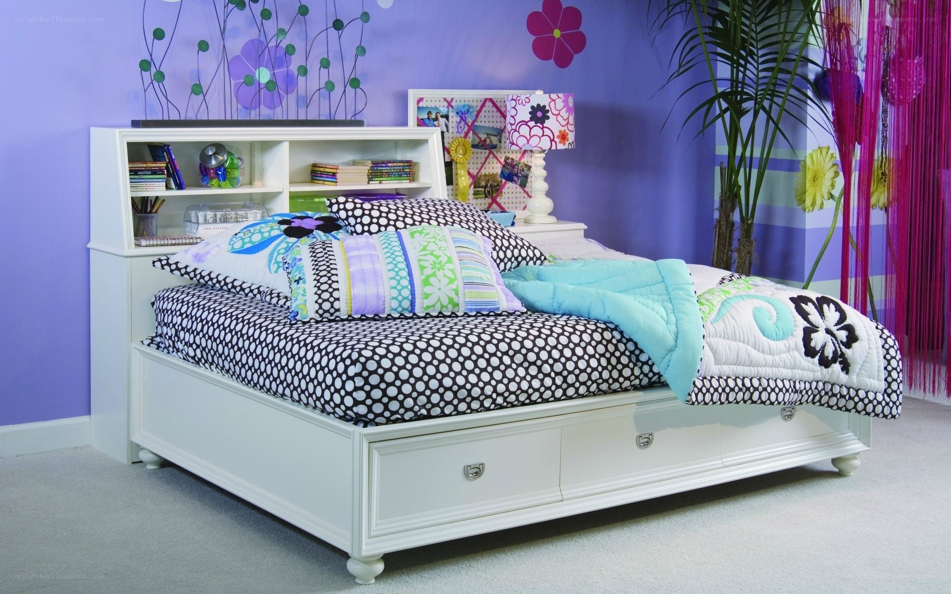 colorful bedroom with storage bed