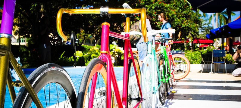 Colorful bikes by poolside