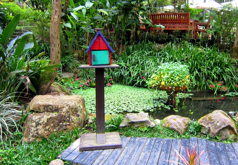 Colorful Birdhouse in Garden