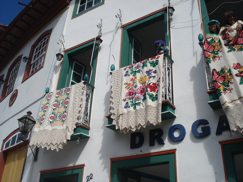 Colorful blankets on balconies