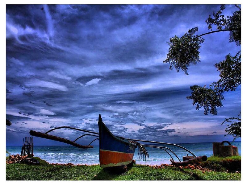 Colorful Boat on Shore — Blue, Dramatic