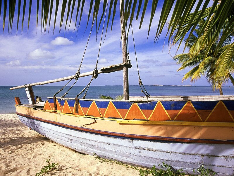 Colorful boat on tropical beach