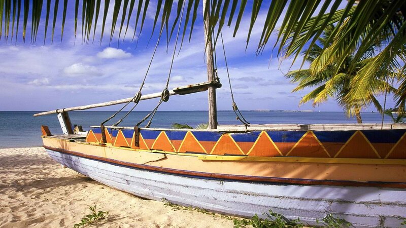 Colorful boat on tropical beach