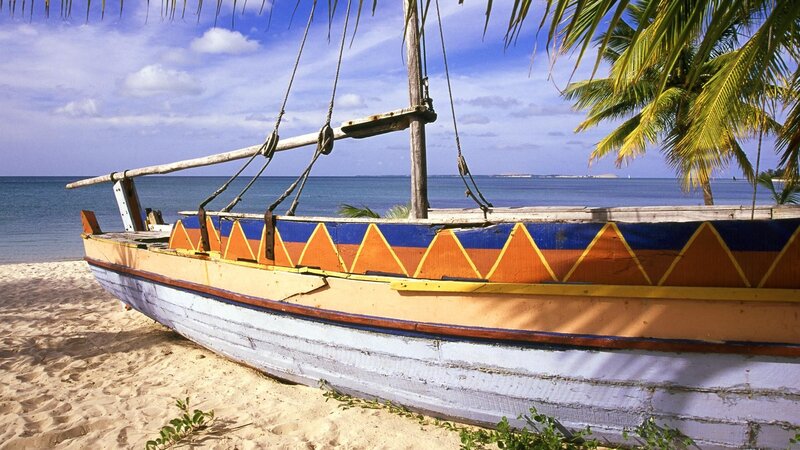 Colorful boat on tropical beach