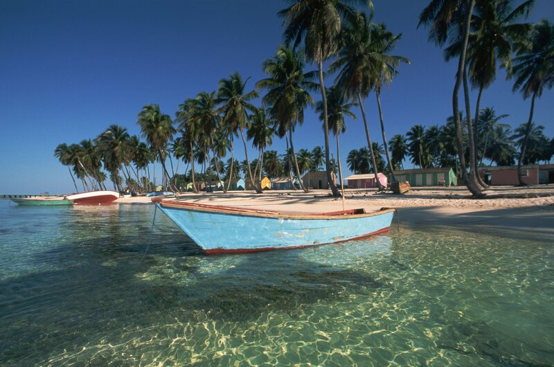 Colorful boat on tropical beach