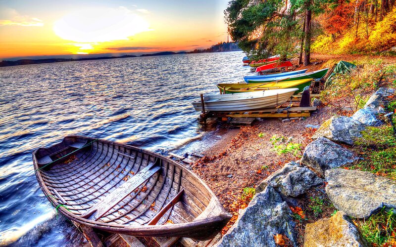Colorful boats at sunset