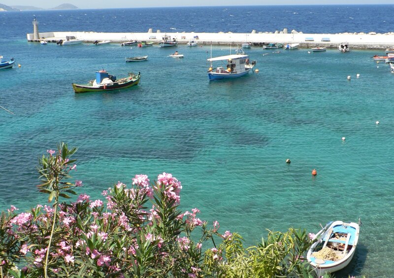 Colorful boats in a turquoise harbor