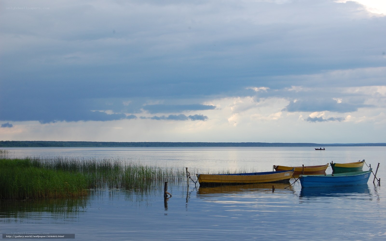 Colorful boats on a calm lake