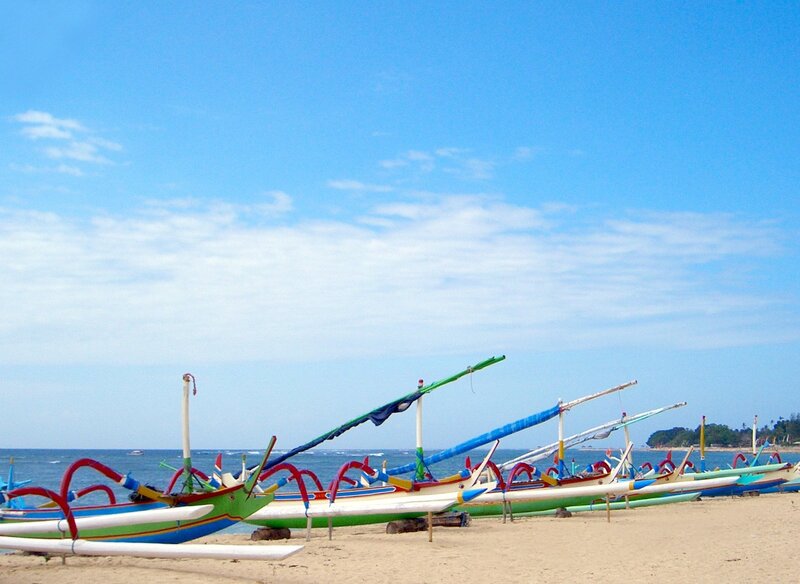 Colorful boats on a sandy beach