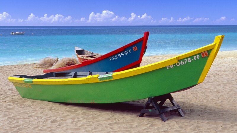 Colorful boats on a tropical beach