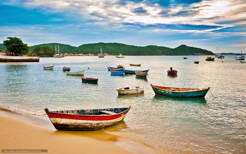 Colorful boats on a tropical beach