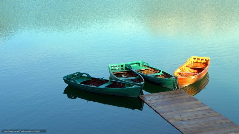 Colorful boats on calm water