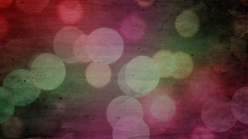 colorful bokeh lights on textured background