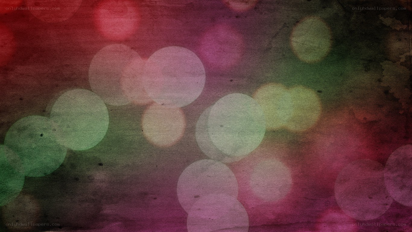 colorful bokeh lights on textured background