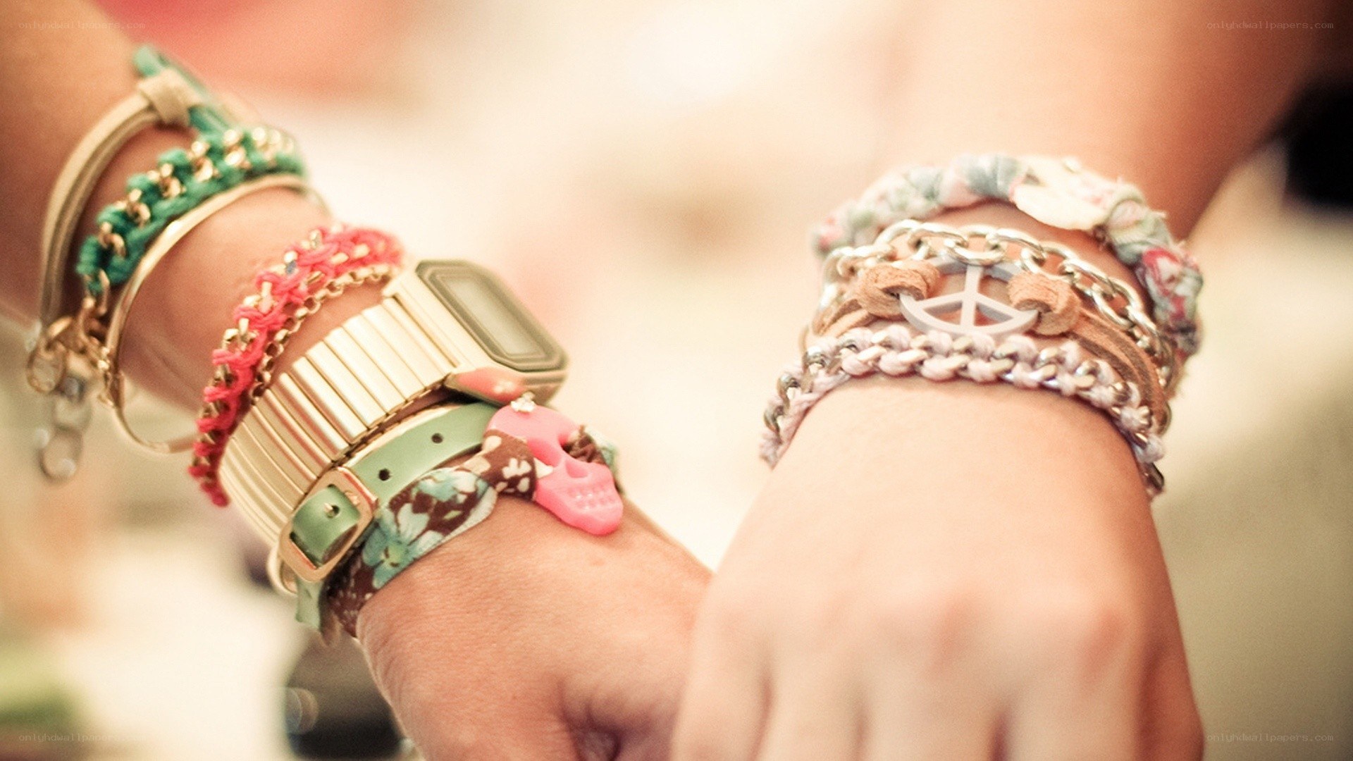 colorful bracelets on wrists