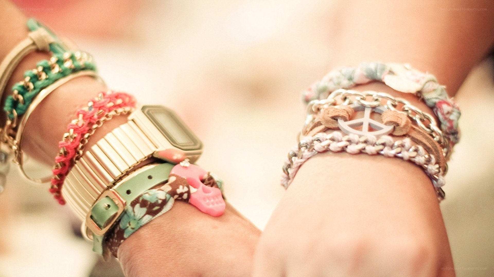 colorful bracelets on wrists