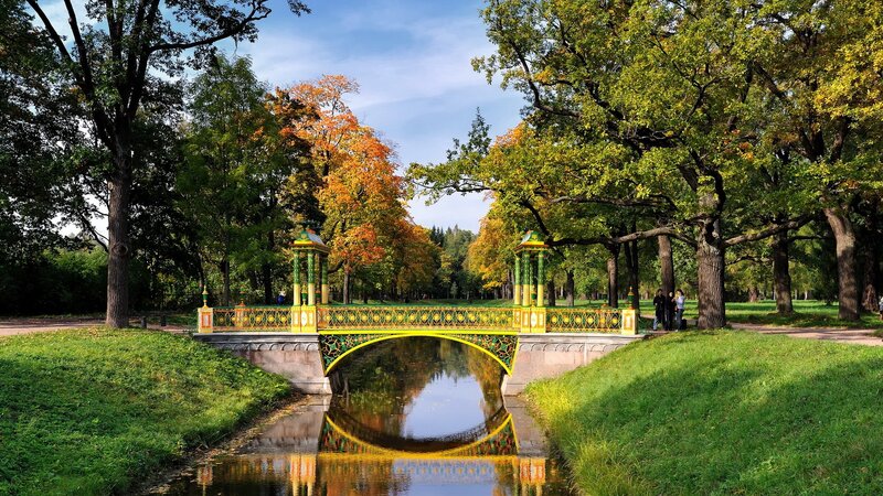 Colorful bridge in autumn park