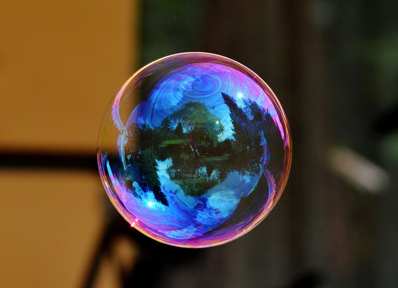 Colorful bubble with landscape reflection