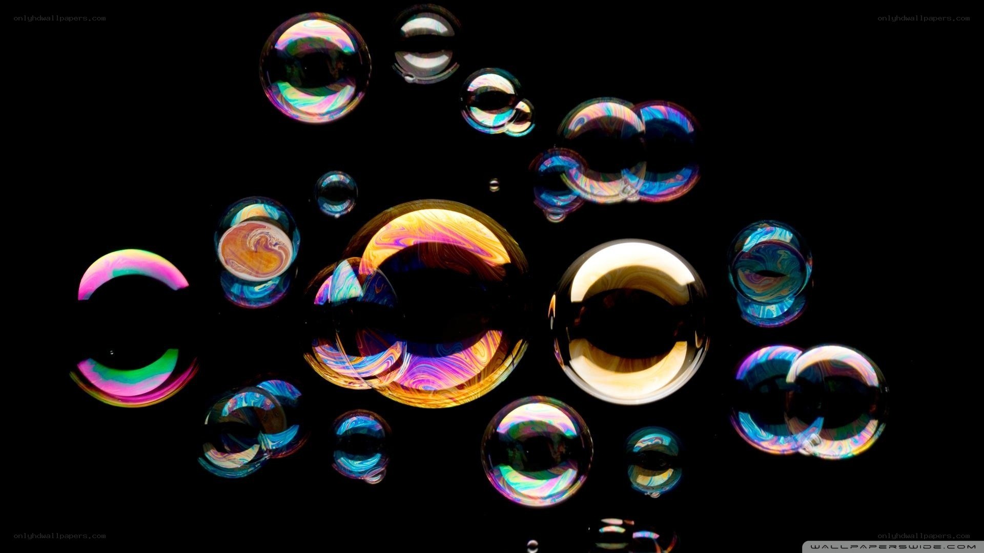 Colorful bubbles on black background