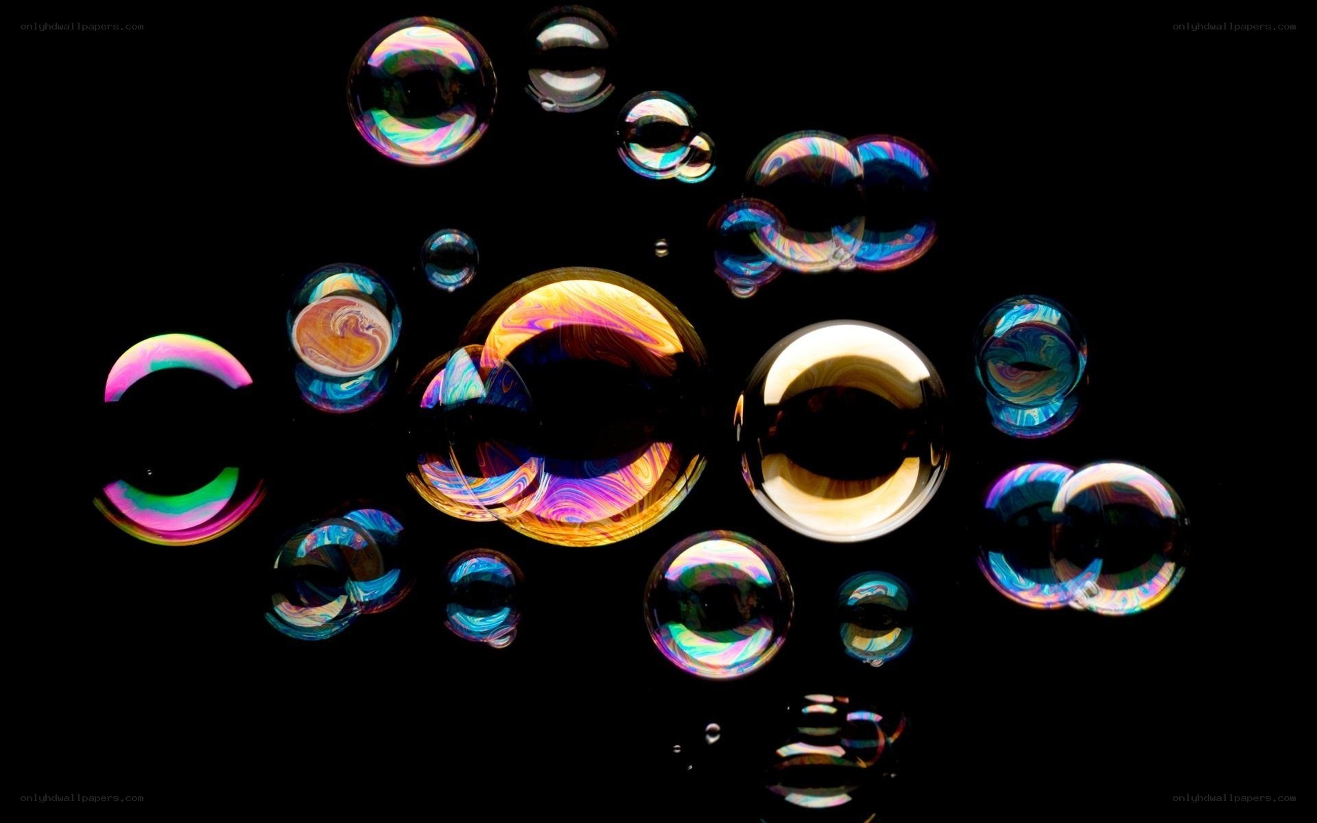 Colorful bubbles on black background