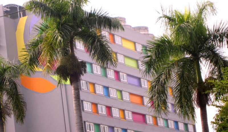 Colorful Building with Palm Trees