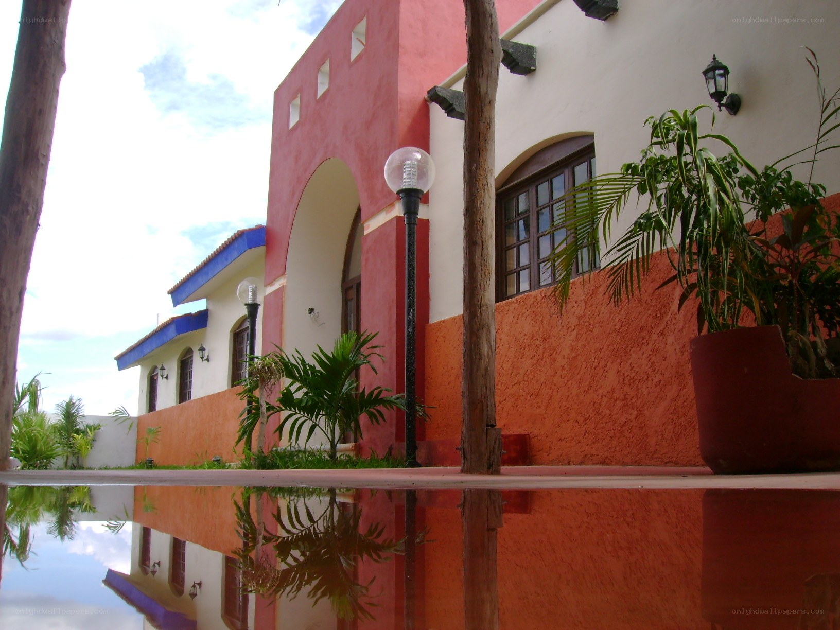 Colorful building with pool reflection