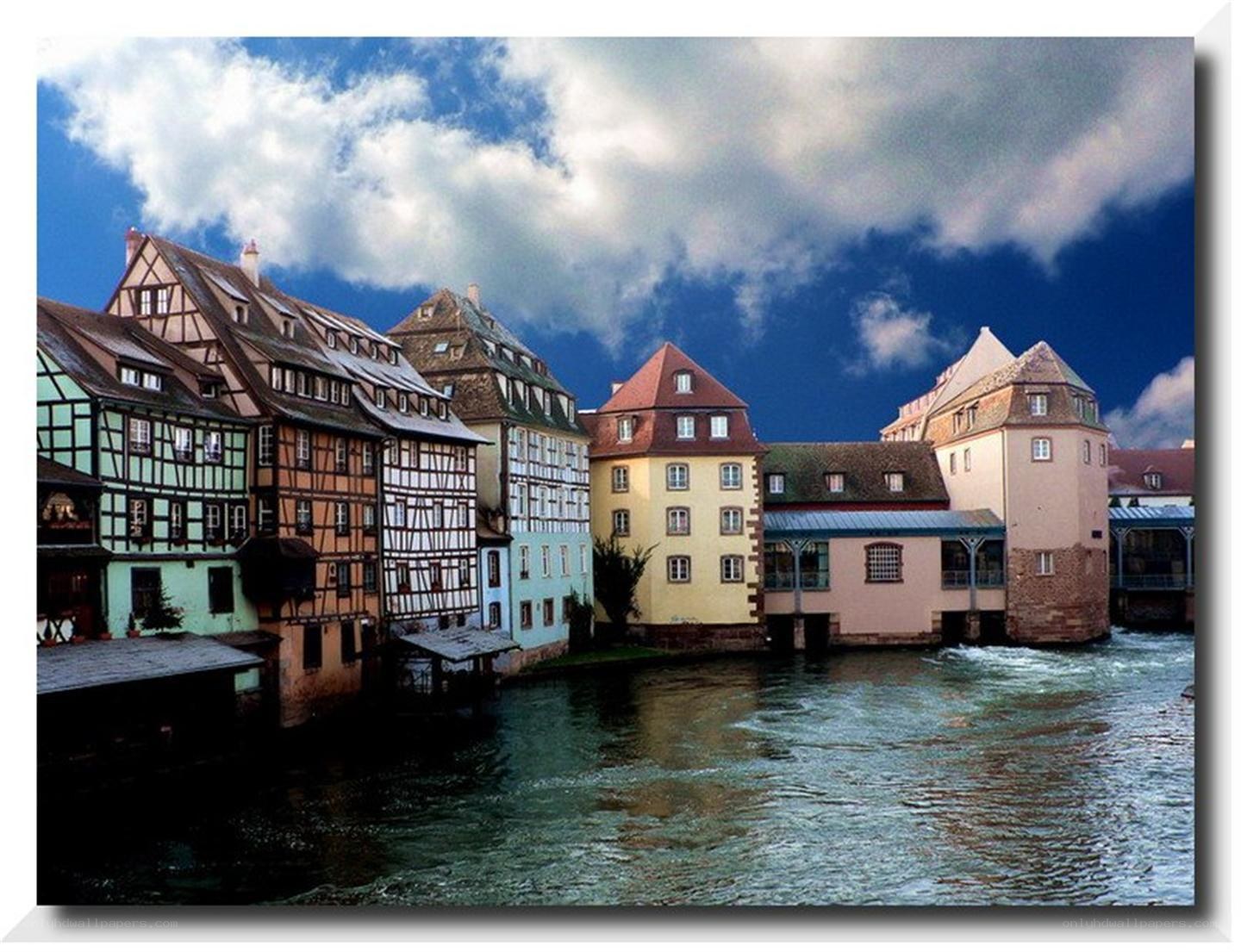 Colorful buildings along a river