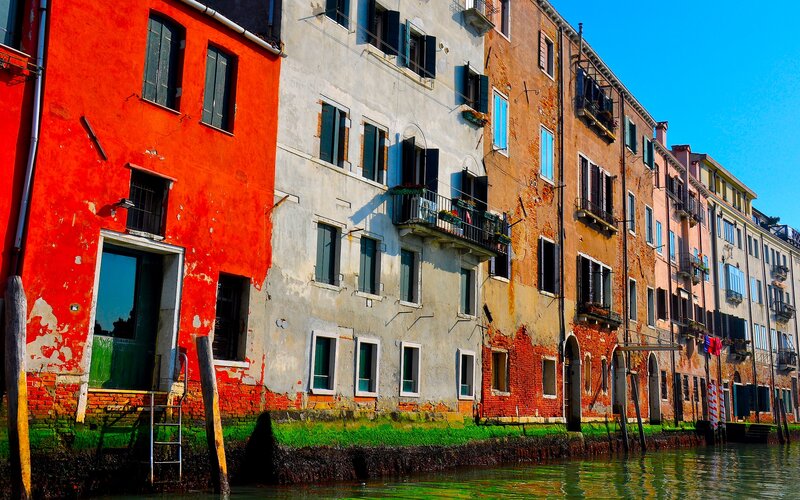 Colorful buildings along a Venetian canal