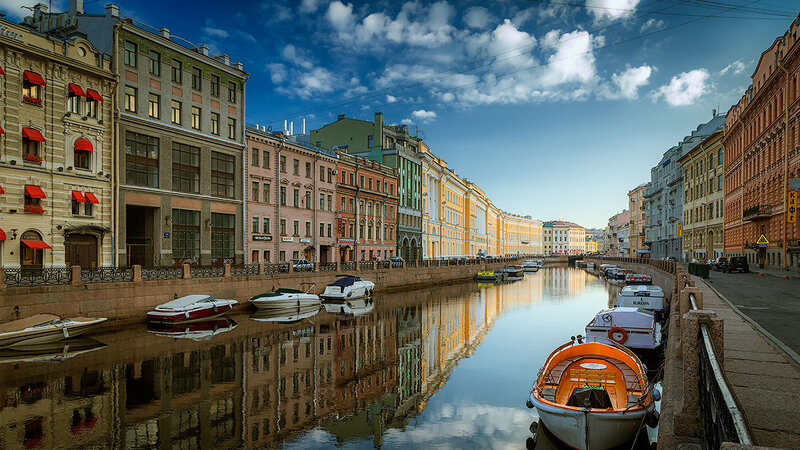 Colorful Buildings Along Canal — Blue
