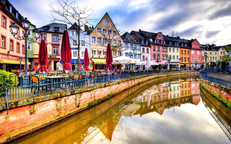 Colorful Buildings Along Canal — Red