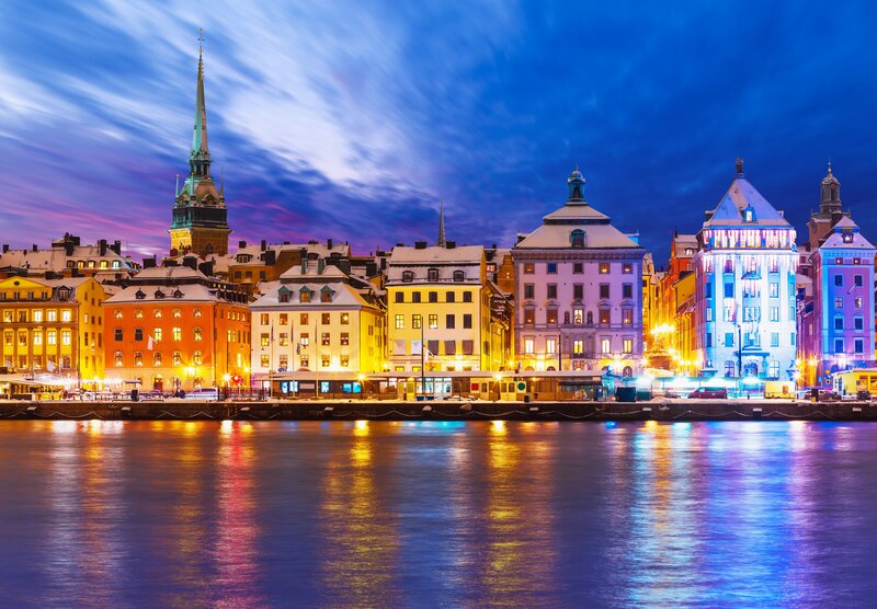 Colorful Buildings at Night — Blue, Dramatic, Photograph