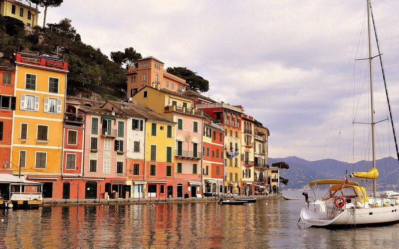 Colorful Buildings by Water — Yellow