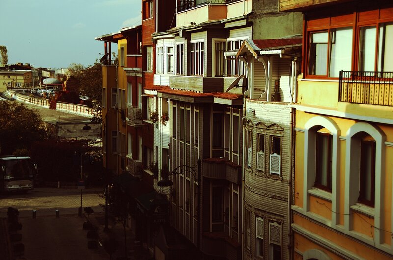 Colorful Buildings in City — Yellow, Dramatic