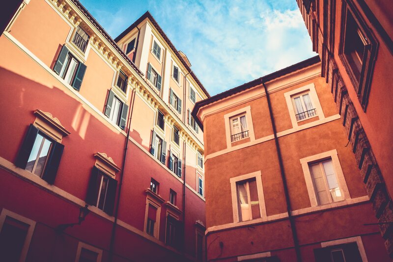 Colorful Buildings in Courtyard — Red
