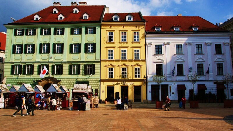 Colorful Buildings in Square — Green