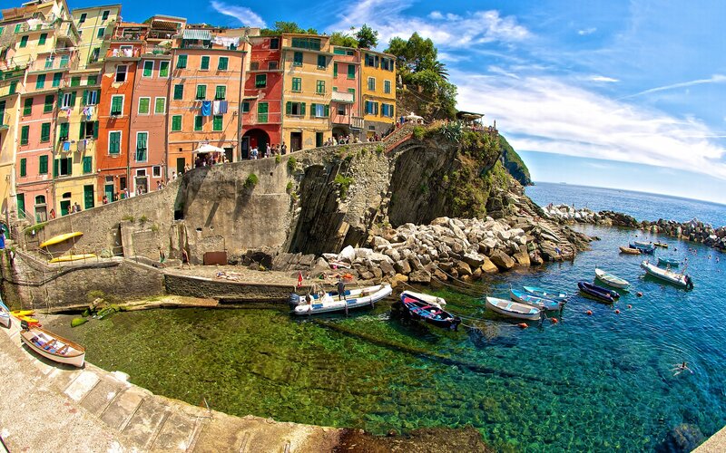 Colorful Buildings on Cliff — Blue, Serene