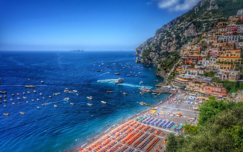 Colorful Buildings on Cliff — Blue, Vibrant