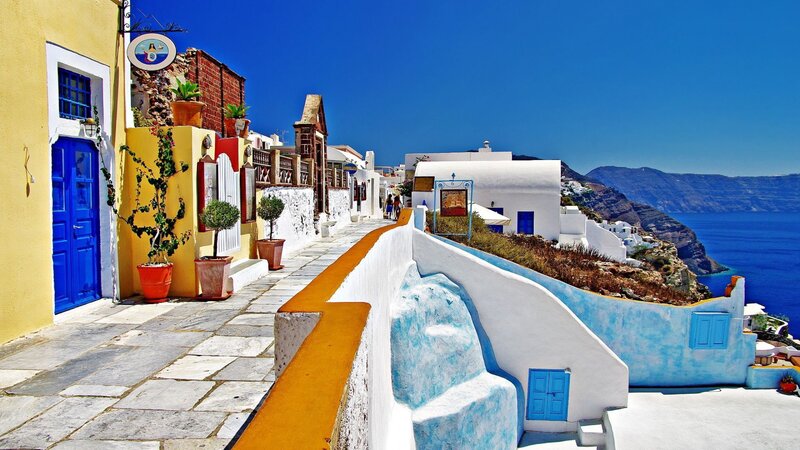 Colorful Buildings on Cliff — White