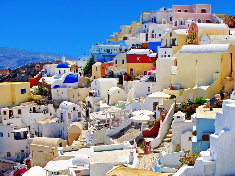 Colorful Buildings on Hillside — White