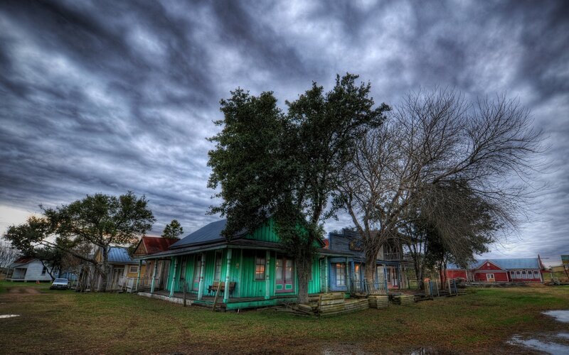 Colorful Buildings under Stormy Sky