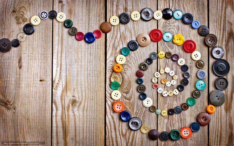 Colorful buttons on wood