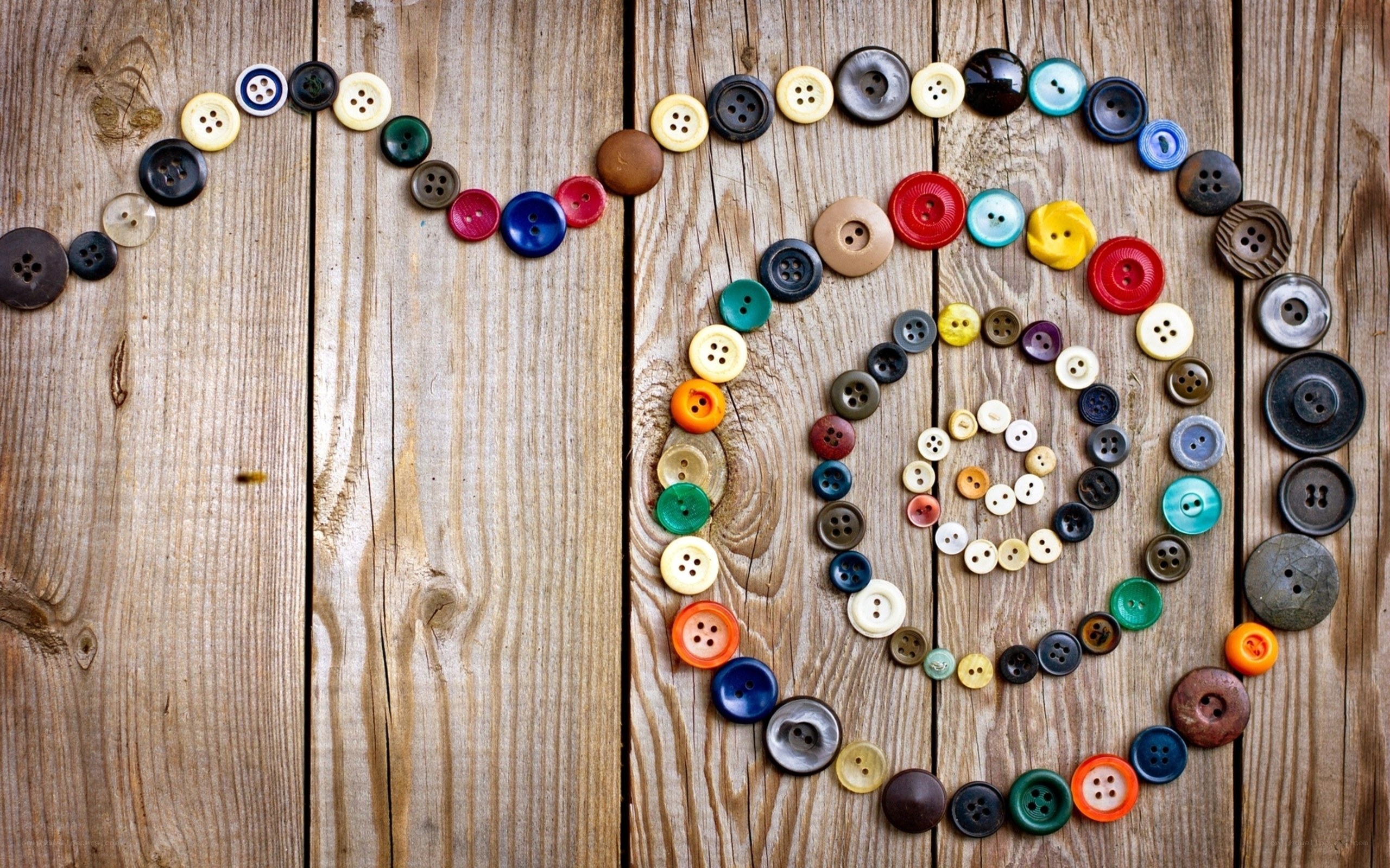 Colorful buttons on wood