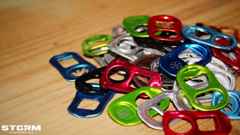 colorful can tabs on wood